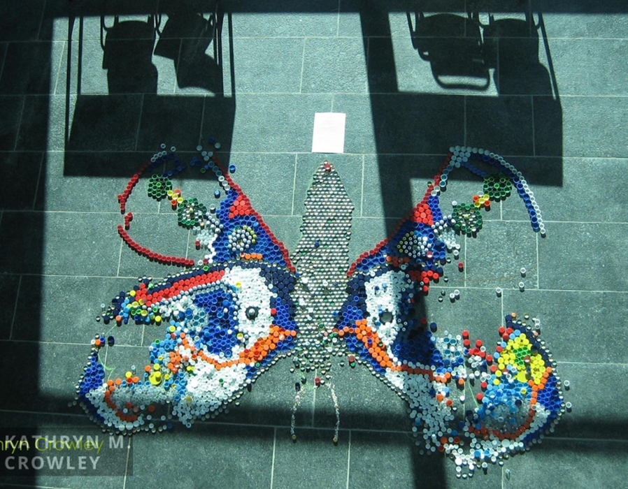 'Message on wings' (2004). Photo shows hundreds of plastic bottle tops which I arranged into a butterfly shape over a 10 hour period.
